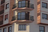 Infografía rehabilitación fachada en piedra y gresite