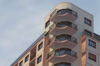 Infografía rehabilitación fachada en piedra y gresite